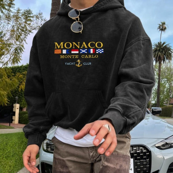 Crest detail pullover hoodie shown in black