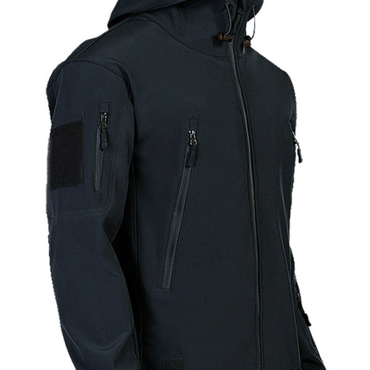 Multi-pocket hooded softshell jacket, front zipped view