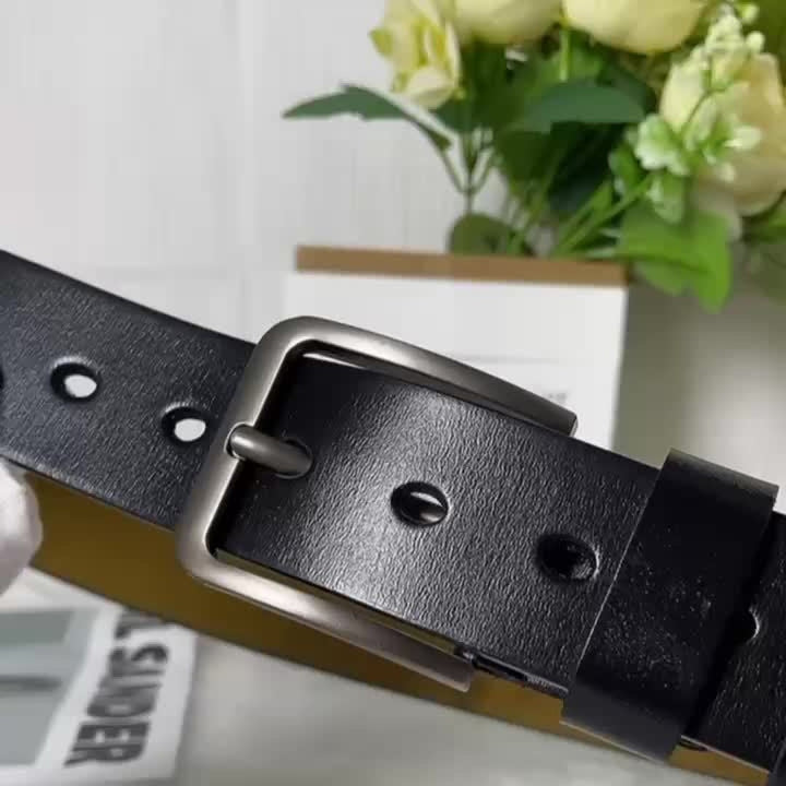 Pin buckle leather-look belt, buckle detail view