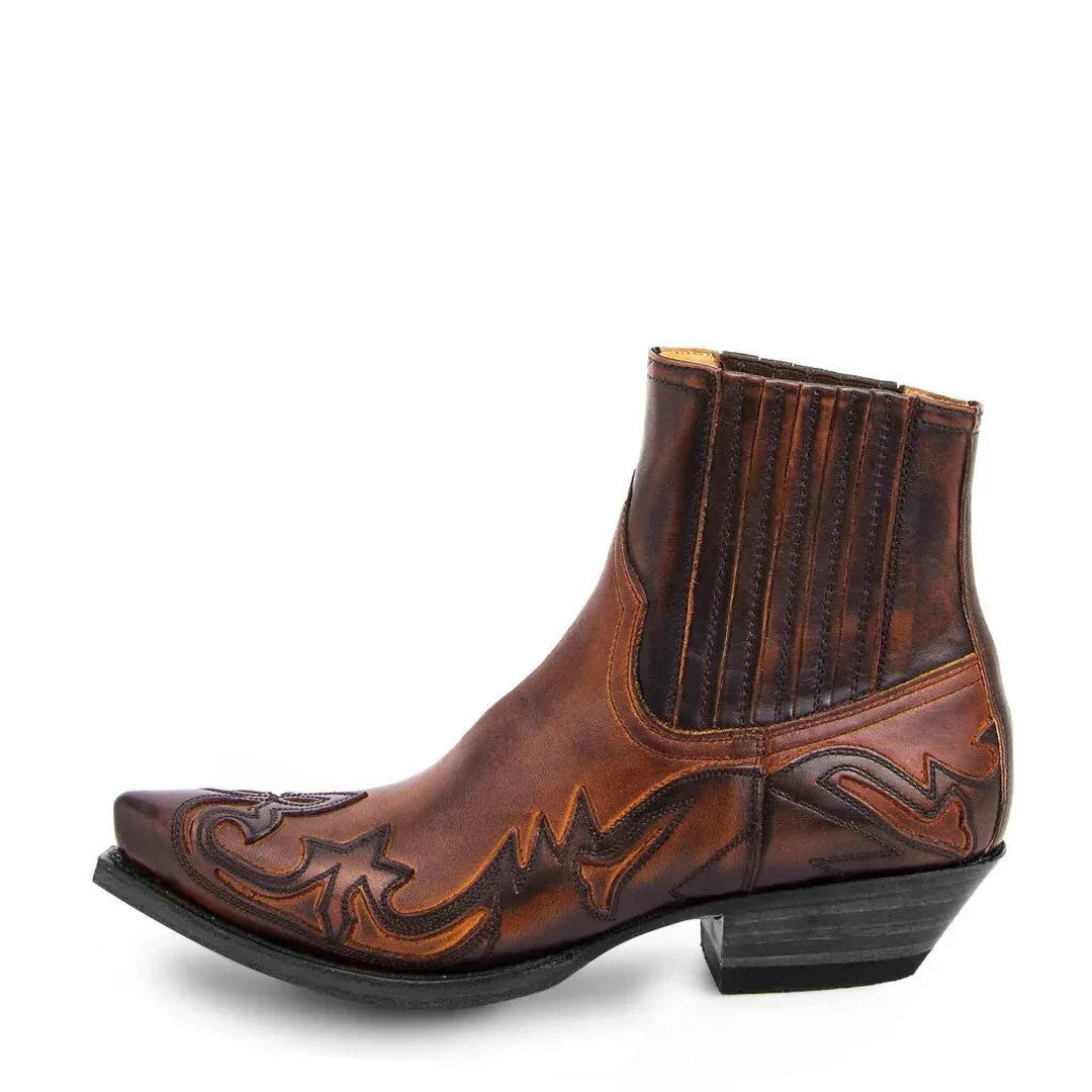 Stitched panel western boot shown in brown